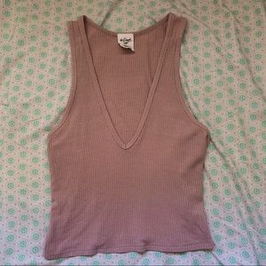light pink ribbed tank top with deep v neck line